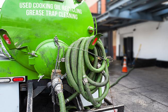 workers at Grease Trap Cleaning of Merritt Island